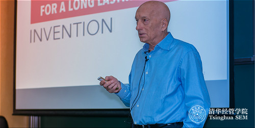 Dr. Luigi Tiziano Peccenini speaking at the TIEMBA Leadership Forum logo.jpg